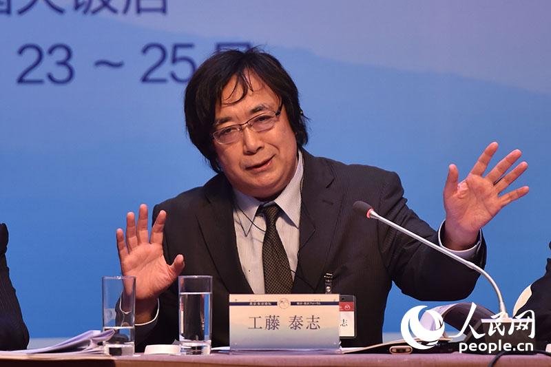 言論NPO理事長工藤泰志。 翁奇羽攝