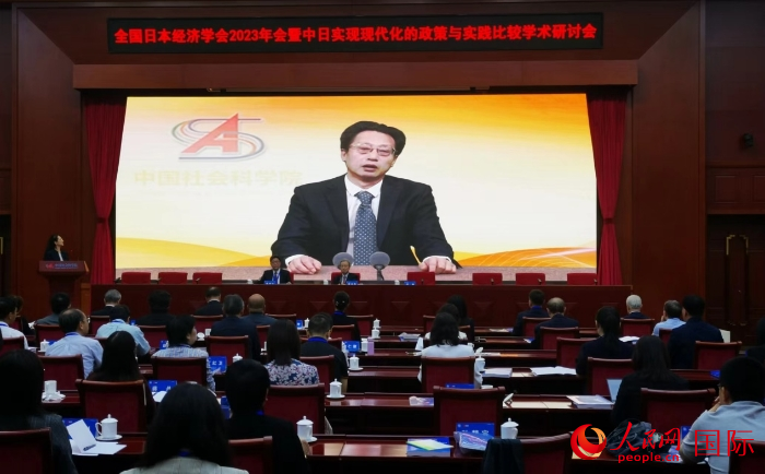 中国社会科学院副院长王昌林发表视频致辞。人民网记者 陈建军摄